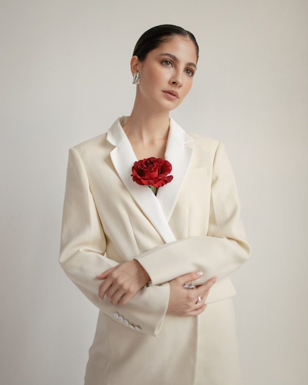 woman wearing white blazer